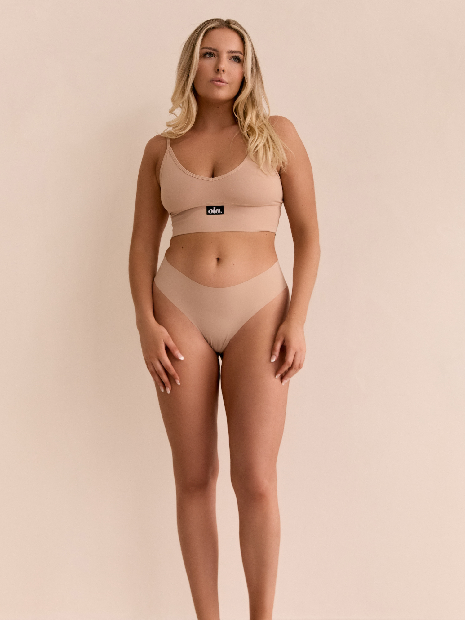 Cream Tan Bikini Thong model three-quarter view