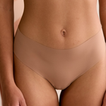 Headless Model Shot  front on wearing seamless Bikini Thong in Macchiato.