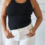 Tayla (size 12) wearing the sculpt tank in Medium Black.
