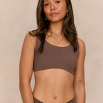 Larni  wearing matching Ola set Seamless Comfort Crop and Bikini Thong in Hot Fudge