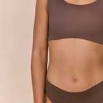 Headless Model Shot  wearing matching Ola set Seamless Comfort Crop and Bikini Thong in Hot Fudge