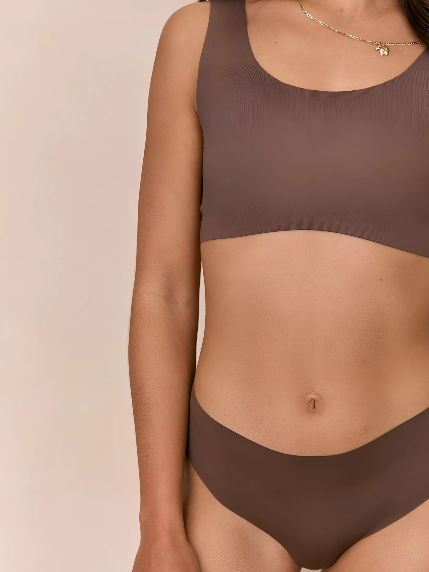 Headless Model Shot  wearing matching Ola set Seamless Comfort Crop and Bikini Thong in Hot Fudge