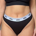 Black Iconic Thong on model front view